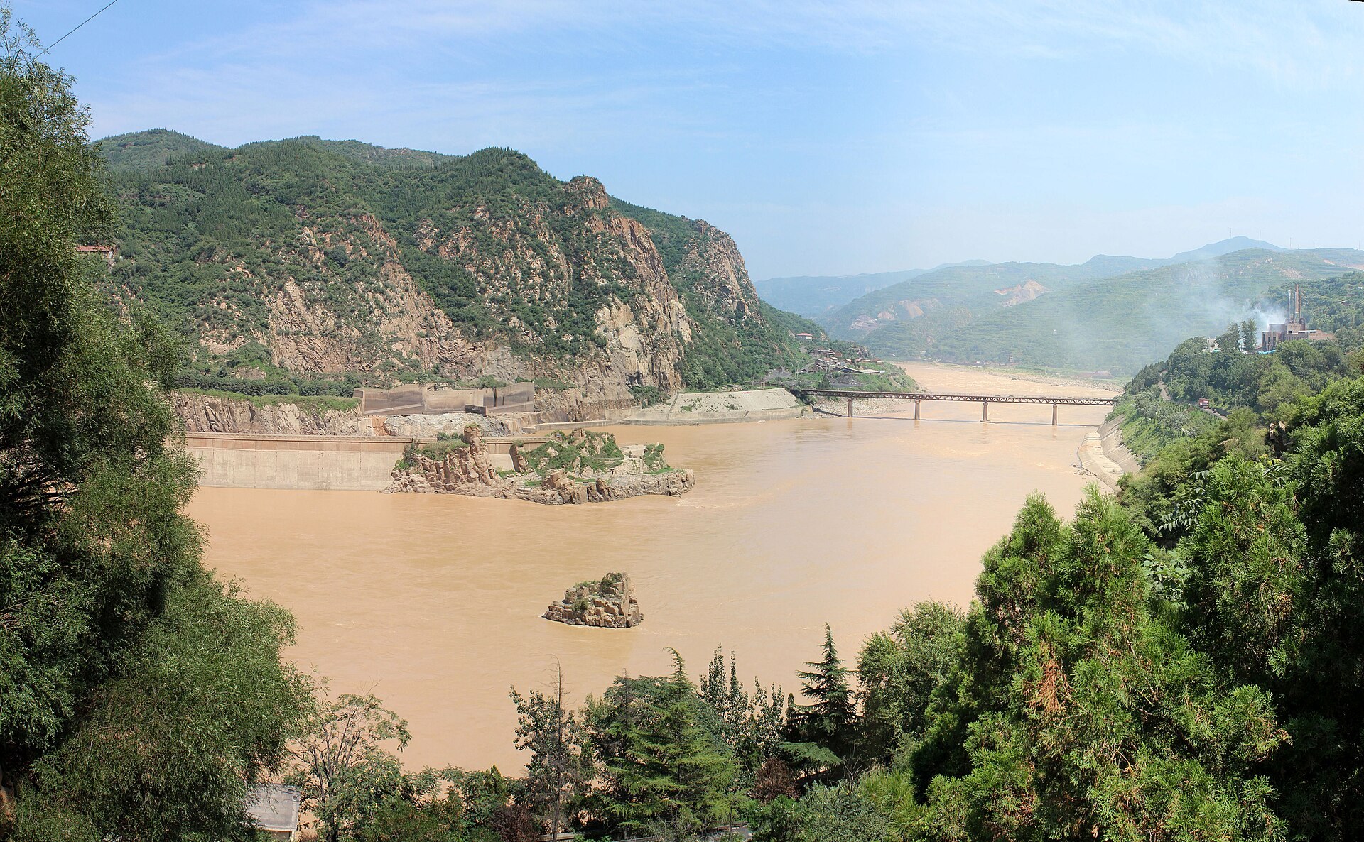 The sediment-laden Yellow River winding through a steep valley.