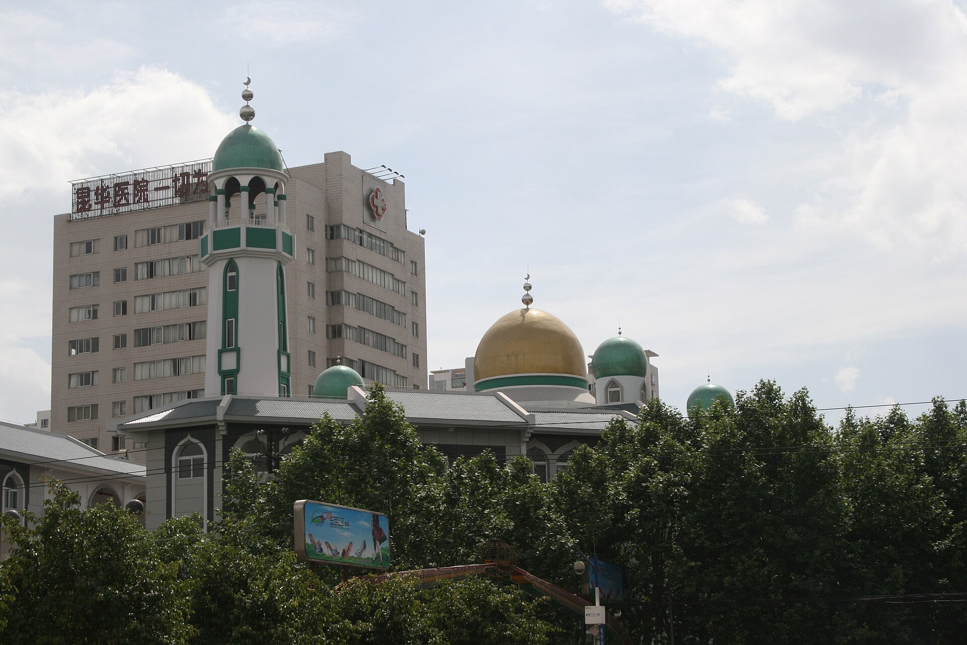 The domes and minaret of a mosque in Kunming.