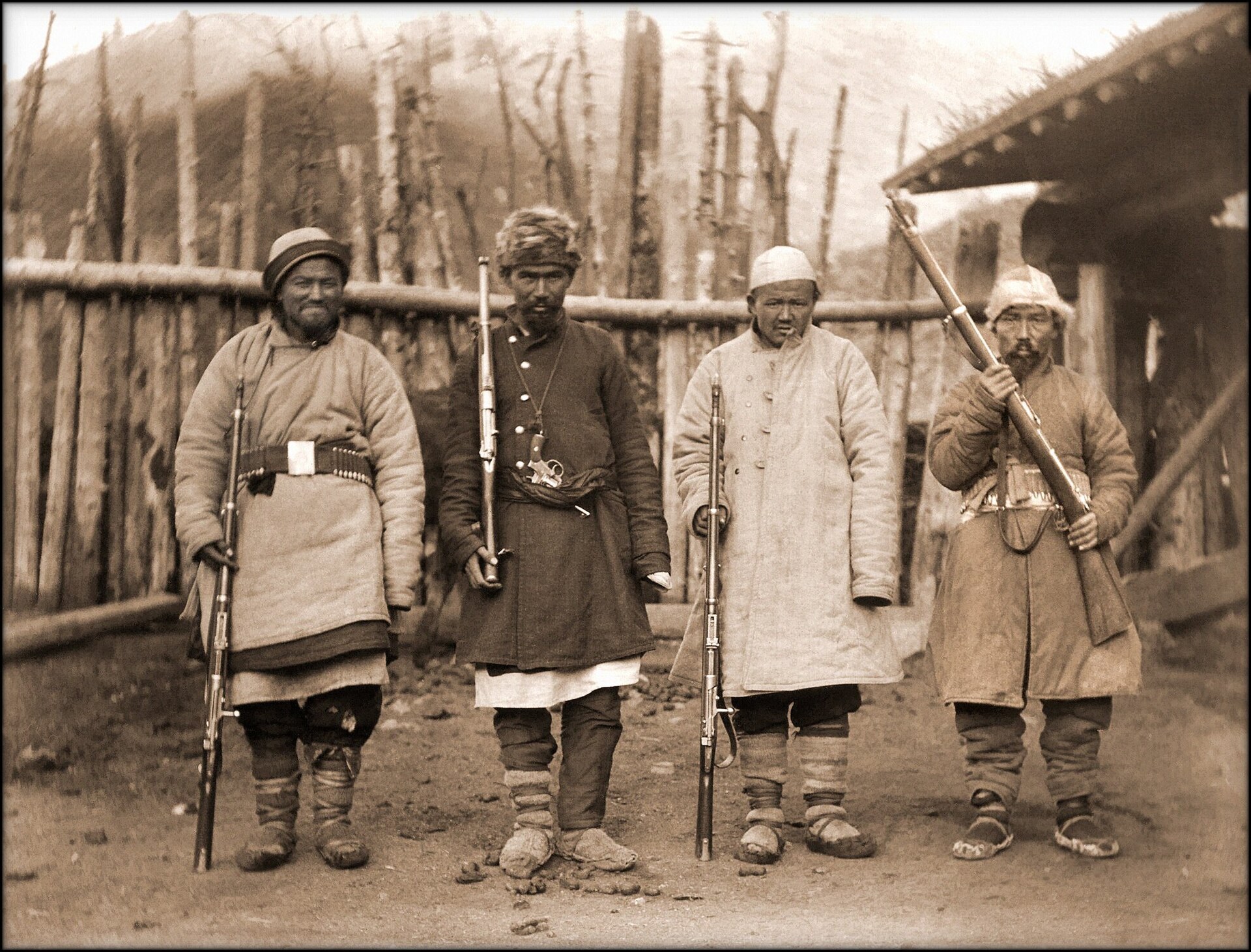 Armed men identified as bandits in Xinjiang, photographed around 1915.